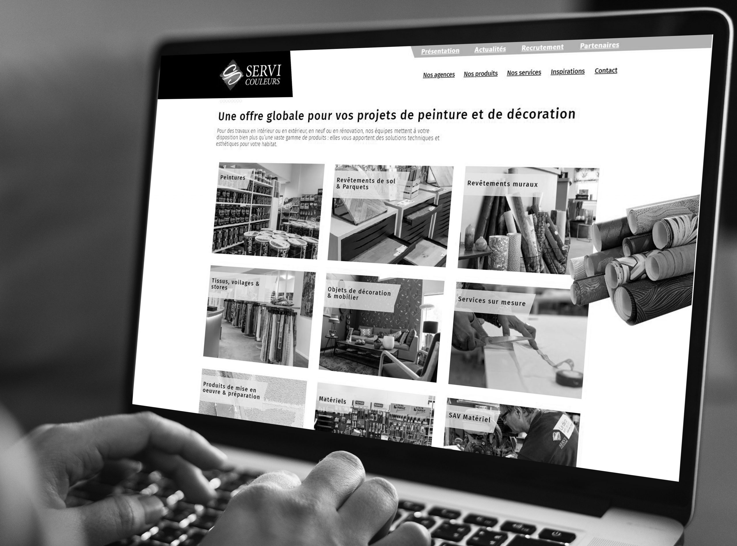 working on a web template on the laptop working on a web template on the laptop